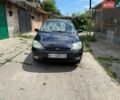 Синий Форд Фокус, объемом двигателя 1.6 л и пробегом 346 тыс. км за 2800 $, фото 1 на Automoto.ua