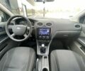 Синий Форд Фокус, объемом двигателя 1.4 л и пробегом 225 тыс. км за 4100 $, фото 15 на Automoto.ua