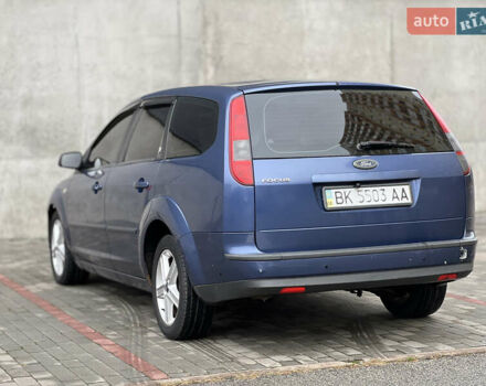 Синий Форд Фокус, объемом двигателя 2 л и пробегом 260 тыс. км за 5500 $, фото 5 на Automoto.ua