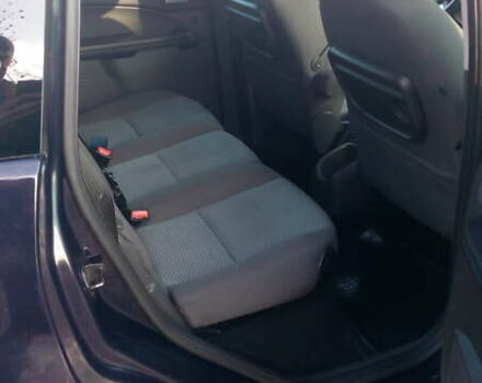 Синий Форд Фокус, объемом двигателя 1.8 л и пробегом 198 тыс. км за 5800 $, фото 14 на Automoto.ua