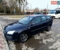 Синий Форд Фокус, объемом двигателя 1.6 л и пробегом 318 тыс. км за 4300 $, фото 1 на Automoto.ua
