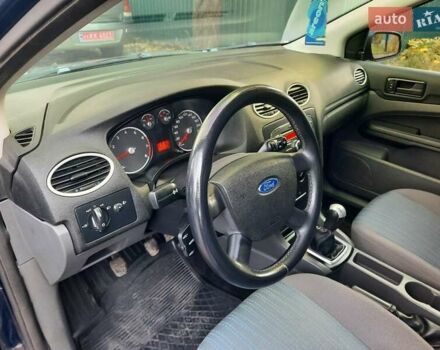 Синий Форд Фокус, объемом двигателя 1.6 л и пробегом 360 тыс. км за 4550 $, фото 11 на Automoto.ua