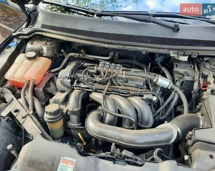 Синий Форд Фокус, объемом двигателя 1.6 л и пробегом 360 тыс. км за 4550 $, фото 105 на Automoto.ua