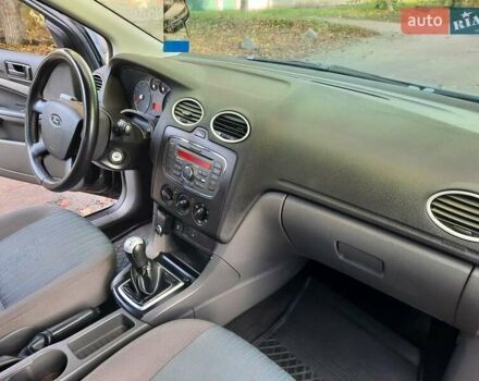 Синий Форд Фокус, объемом двигателя 1.6 л и пробегом 360 тыс. км за 4550 $, фото 72 на Automoto.ua