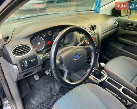 Синий Форд Фокус, объемом двигателя 1.6 л и пробегом 360 тыс. км за 4550 $, фото 56 на Automoto.ua