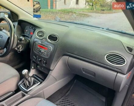 Синий Форд Фокус, объемом двигателя 1.6 л и пробегом 360 тыс. км за 4550 $, фото 28 на Automoto.ua