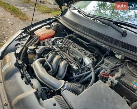 Синий Форд Фокус, объемом двигателя 1.6 л и пробегом 360 тыс. км за 4550 $, фото 100 на Automoto.ua