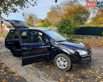 Синий Форд Фокус, объемом двигателя 1.6 л и пробегом 360 тыс. км за 4550 $, фото 104 на Automoto.ua