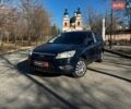 Синий Форд Фокус, объемом двигателя 1.8 л и пробегом 233 тыс. км за 4940 $, фото 1 на Automoto.ua