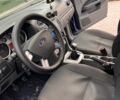Синій Форд Фокус, об'ємом двигуна 1.6 л та пробігом 258 тис. км за 4999 $, фото 6 на Automoto.ua