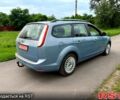 Синий Форд Фокус, объемом двигателя 1.8 л и пробегом 150 тыс. км за 6100 $, фото 2 на Automoto.ua
