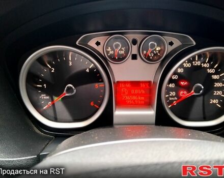 Форд Фокус 2009 у Коростене на Automoto.ua Синій Форд Фокус, об'ємом двигуна 1.8 л та пробігом 236 тис. км за 5200 $, фото 7 на Automoto.ua