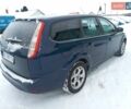 Синій Форд Фокус, об'ємом двигуна 1.8 л та пробігом 228 тис. км за 4600 $, фото 3 на Automoto.ua