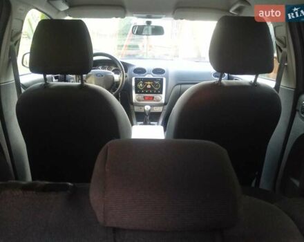 Синій Форд Фокус, об'ємом двигуна 1.6 л та пробігом 283 тис. км за 5461 $, фото 7 на Automoto.ua