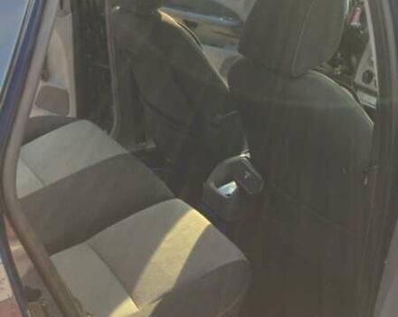 Синий Форд Фокус, объемом двигателя 1.56 л и пробегом 315 тыс. км за 4900 $, фото 11 на Automoto.ua