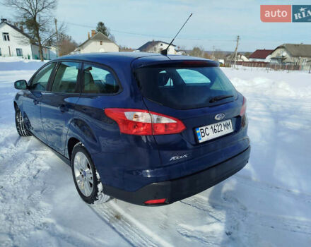 Синій Форд Фокус, об'ємом двигуна 1.56 л та пробігом 279 тис. км за 6350 $, фото 11 на Automoto.ua