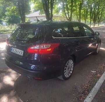 Синій Форд Фокус, об'ємом двигуна 2 л та пробігом 212 тис. км за 7500 $, фото 4 на Automoto.ua