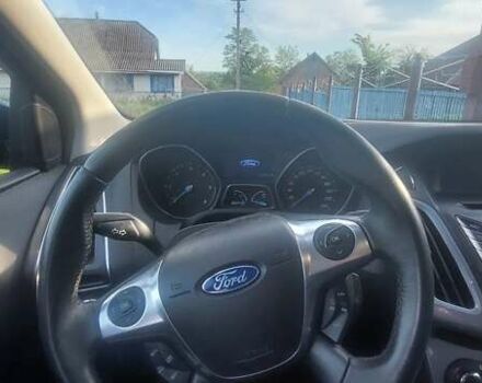 Синій Форд Фокус, об'ємом двигуна 2 л та пробігом 212 тис. км за 7500 $, фото 9 на Automoto.ua