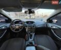 Синій Форд Фокус, об'ємом двигуна 1 л та пробігом 235 тис. км за 4699 $, фото 12 на Automoto.ua