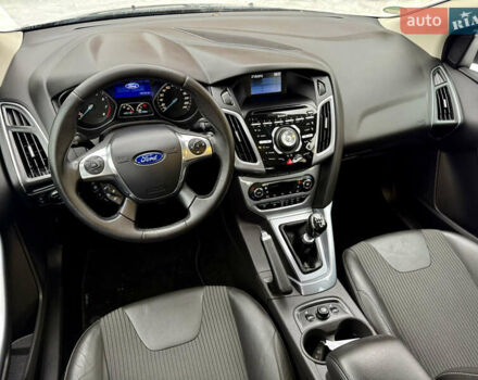 Синій Форд Фокус, об'ємом двигуна 1 л та пробігом 106 тис. км за 5499 $, фото 20 на Automoto.ua