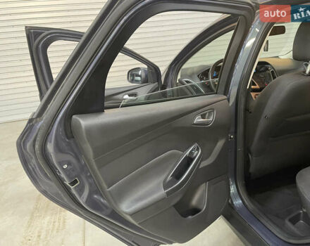 Синій Форд Фокус, об'ємом двигуна 1.6 л та пробігом 217 тис. км за 8350 $, фото 48 на Automoto.ua