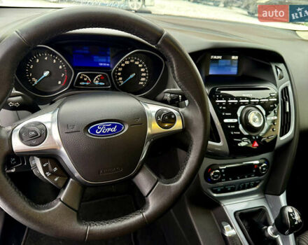 Синій Форд Фокус, об'ємом двигуна 1 л та пробігом 106 тис. км за 5499 $, фото 15 на Automoto.ua