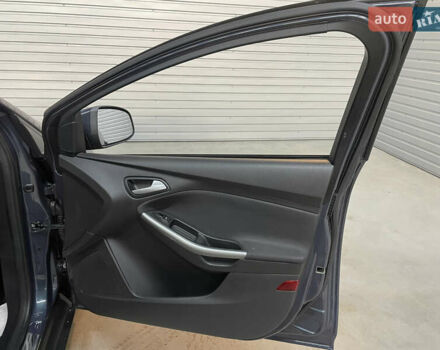 Синій Форд Фокус, об'ємом двигуна 1.6 л та пробігом 217 тис. км за 8350 $, фото 44 на Automoto.ua