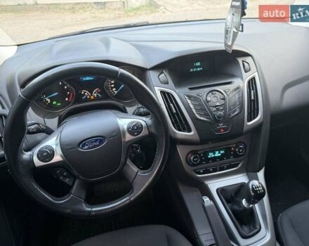 Синий Форд Фокус, объемом двигателя 1 л и пробегом 175 тыс. км за 5600 $, фото 6 на Automoto.ua