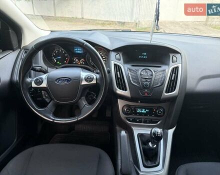 Синий Форд Фокус, объемом двигателя 1 л и пробегом 175 тыс. км за 5600 $, фото 12 на Automoto.ua