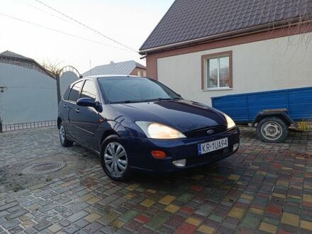 Синий Форд Фокус, объемом двигателя 1.8 л и пробегом 250 тыс. км за 950 $, фото 1 на Automoto.ua