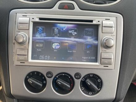 Синий Форд Фокус, объемом двигателя 1.4 л и пробегом 325 тыс. км за 3800 $, фото 1 на Automoto.ua