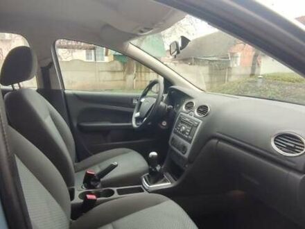 Синий Форд Фокус, объемом двигателя 1.8 л и пробегом 290 тыс. км за 3000 $, фото 1 на Automoto.ua