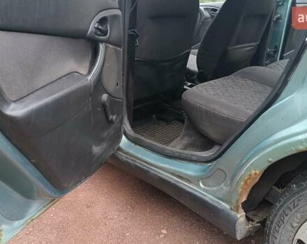 Зеленый Форд Фокус, объемом двигателя 1.6 л и пробегом 352 тыс. км за 3200 $, фото 13 на Automoto.ua