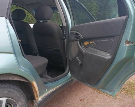 Зеленый Форд Фокус, объемом двигателя 1.6 л и пробегом 352 тыс. км за 3000 $, фото 9 на Automoto.ua