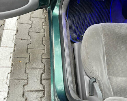 Зеленый Форд Фокус, объемом двигателя 2 л и пробегом 350 тыс. км за 2800 $, фото 12 на Automoto.ua