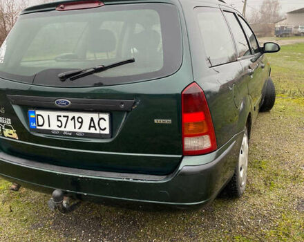 Зеленый Форд Фокус, объемом двигателя 1.8 л и пробегом 250 тыс. км за 2999 $, фото 8 на Automoto.ua