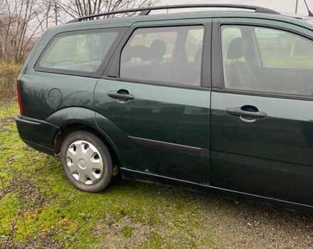 Зеленый Форд Фокус, объемом двигателя 1.8 л и пробегом 250 тыс. км за 2999 $, фото 6 на Automoto.ua