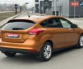 Помаранчевий Форд Фокус, об'ємом двигуна 1 л та пробігом 162 тис. км за 7999 $, фото 3 на Automoto.ua