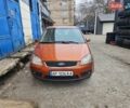 Оранжевый Форд Фокус, объемом двигателя 1.8 л и пробегом 300 тыс. км за 3700 $, фото 1 на Automoto.ua