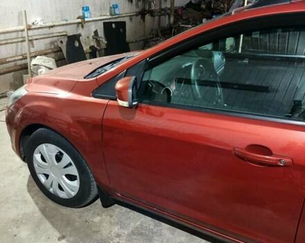 Оранжевый Форд Фокус, объемом двигателя 1.8 л и пробегом 300 тыс. км за 5600 $, фото 4 на Automoto.ua