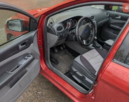 Оранжевый Форд Фокус, объемом двигателя 1.8 л и пробегом 170 тыс. км за 4000 $, фото 13 на Automoto.ua