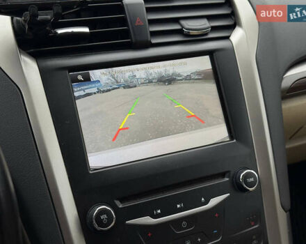 Білий Форд Фьюжен, об'ємом двигуна 2 л та пробігом 153 тис. км за 9500 $, фото 25 на Automoto.ua