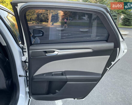 Білий Форд Фьюжен, об'ємом двигуна 2 л та пробігом 169 тис. км за 13000 $, фото 11 на Automoto.ua