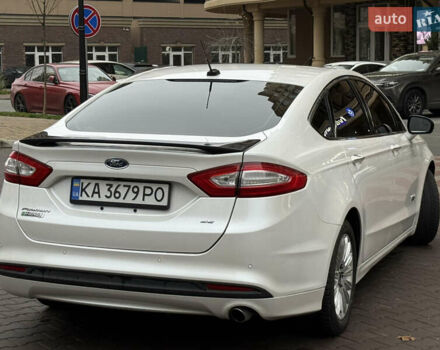 Білий Форд Фьюжен, об'ємом двигуна 2 л та пробігом 225 тис. км за 9800 $, фото 2 на Automoto.ua