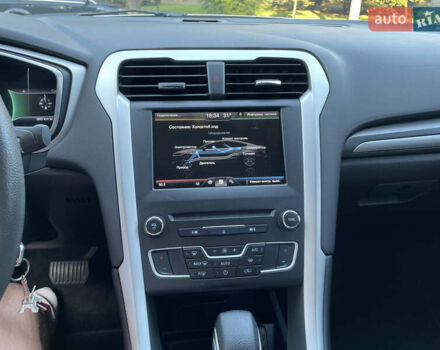 Білий Форд Фьюжен, об'ємом двигуна 2 л та пробігом 169 тис. км за 13000 $, фото 13 на Automoto.ua