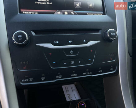 Білий Форд Фьюжен, об'ємом двигуна 2 л та пробігом 180 тис. км за 11400 $, фото 14 на Automoto.ua
