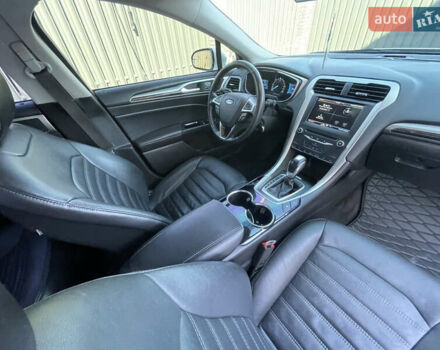 Білий Форд Фьюжен, об'ємом двигуна 2 л та пробігом 180 тис. км за 11400 $, фото 24 на Automoto.ua