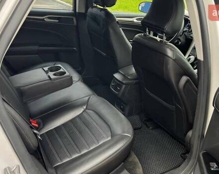 Білий Форд Фьюжен, об'ємом двигуна 2 л та пробігом 176 тис. км за 12500 $, фото 13 на Automoto.ua