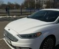 Білий Форд Фьюжен, об'ємом двигуна 2 л та пробігом 206 тис. км за 10800 $, фото 1 на Automoto.ua