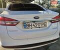 Білий Форд Фьюжен, об'ємом двигуна 2 л та пробігом 173 тис. км за 13500 $, фото 12 на Automoto.ua